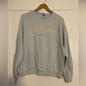 Light blue “East Side Wildwood NJ” crewneck. Soft material.